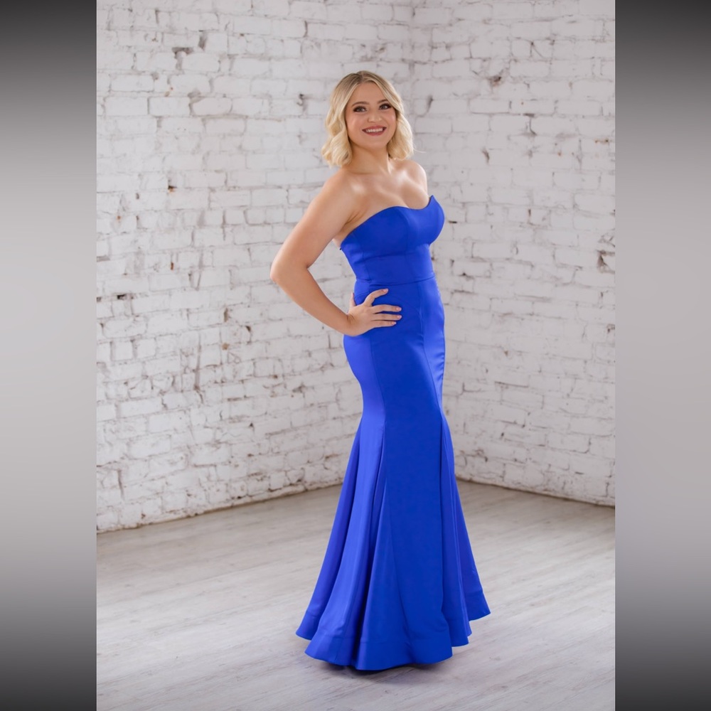 Classy electric blue strapless dance, pageant or formal gown. Worn once.